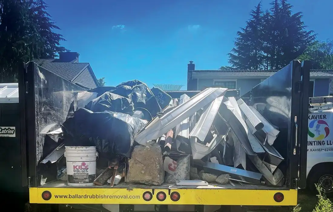 Ballard junk removal service hauling debris from home renovation.